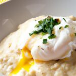 Creamy Cheesy Grits with a Perfectly Poached Egg Delight