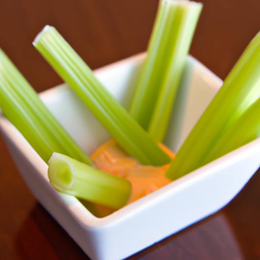 Crunchy Celery Sticks Paired with Zesty Pimento Cheese Delight