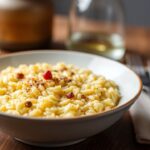 Golden risotto alla Milanese, creamy saffron rice symphony.