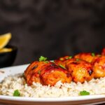 Tandoori chicken's vibrant crimson hue, revealing its fiery heart.