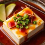 Spicy Japanese Mapo tofu, a vibrant, steaming dish.