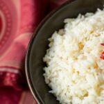 Vibrant Persian Jeweled Rice, a dazzling mosaic of nuts, fruits, and spices.