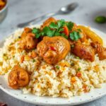 Rich Hyderabadi chicken biryani, a fragrant culinary masterpiece.