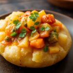 Rich vegetable curry with potatoes, showcasing diverse flavors.