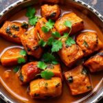 Vibrant vegetable tikka curry, bursting with aromatic spices and rich flavors.