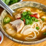 Quick and authentic chicken pho recipe, ready in under an hour.