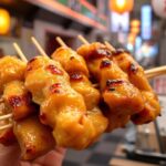 Juicy yakitori skewers sizzling over coals, the heart of Japanese grilling.